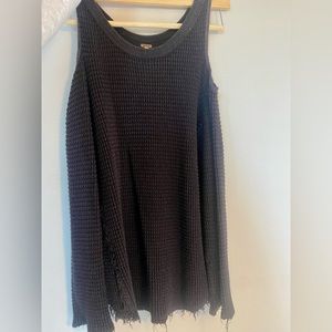 Black free people knit sweater with shoulder slits.